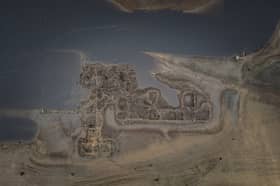 A lost village appears at Ladybower Reservoir, Derbyshire, due to low water levels due to the lack of rain in 2026.