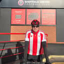 Blade on a Bike has surpassed £10,000 in donations after 10 matches into his mission of cycling to every United away match this season. 