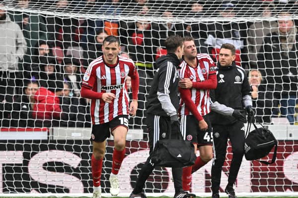 Sheffield United’s Patrick Bamford (centre right) appears to be injured
