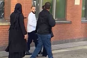 Ghazanfar Hussain, second left, denies one count of rape