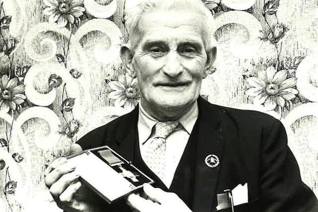 JOHN ‘JACK’ DANIEL CHARLTON SEEN HERE WITH HIS MEDAL