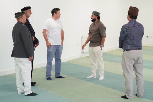Councillor Mark Rusling during a tour of the mosque’s prayer hall