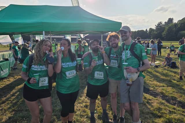 The Star crossed the finish line - your reward is a medal, a paper cup of prosecco and a hot plate dinner.