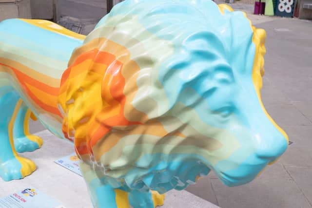 OutLion sculpture decorated by Sheffield artist Rob Lee located in Pinstone Street as part of the Pride of Yorkshire sculpture trail.