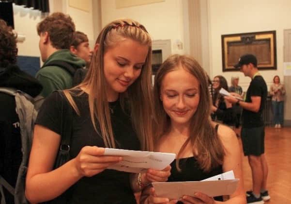 Students at High Storrs School opening up their results on GCSE Results Day 2026.