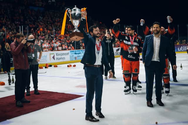 Carton Beston-Will alongside head coach Aaron Fox lifting the 2024 Challenge Cup