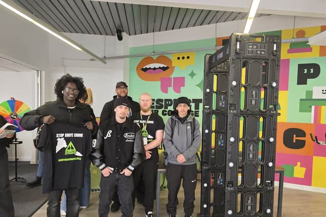 Anthony along with Jack and some of his students during the project.