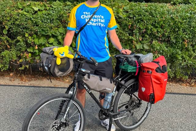 Theo the Sheffield Children's Charity bear has been keeping Dan company on the ride