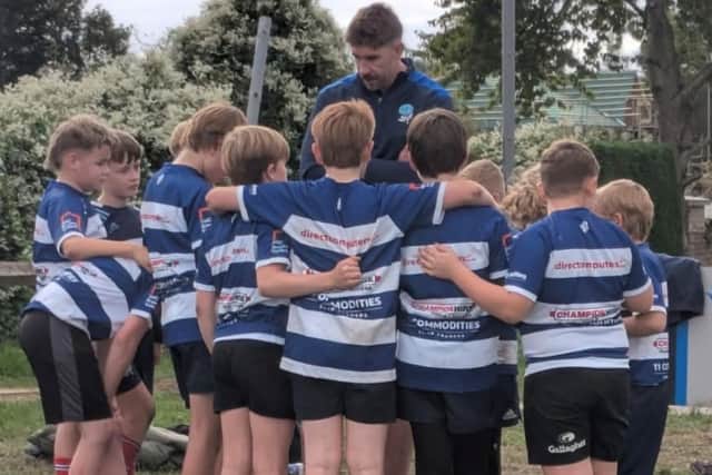 SRUFC team talk with coach and first team player Dom Parsons. 