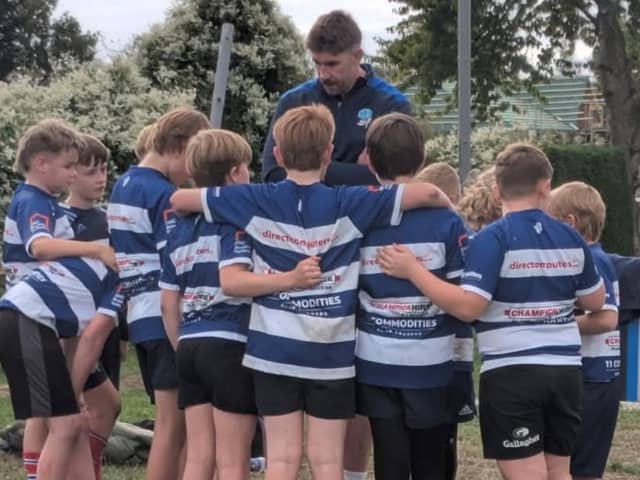 SRUFC team talk with coach and first team player Dom Parsons. 