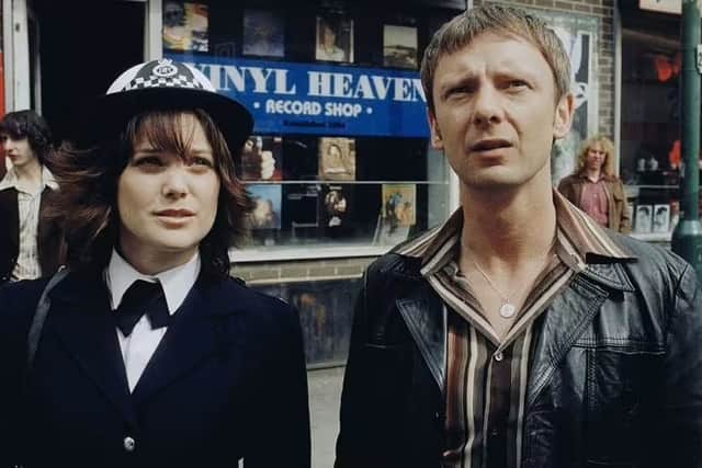Liz White as WPC Annie Cartwright and John Simm as Sam 