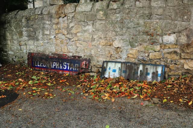 The sign was found buried along with another blank sign