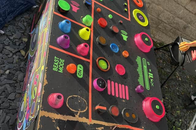 Ms Azar hand makes many of the props, including this DJ deck made from a free table