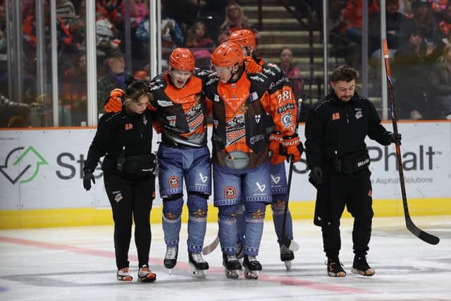 Mikko Juusola helped off the ice in Sundays game with Fife Flyers