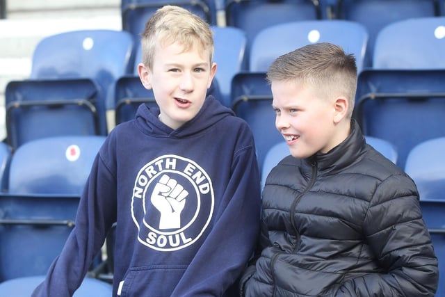 A pair of PNE fans are in full flow of conversation.