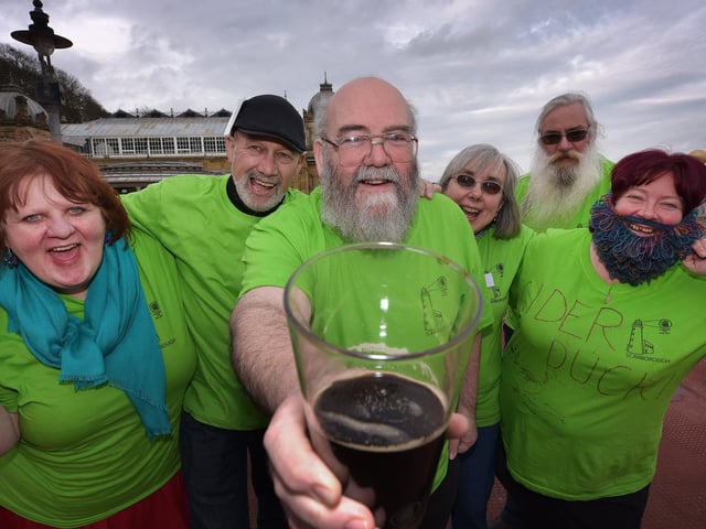 Organiser Stewart Campbell cheers with his team.