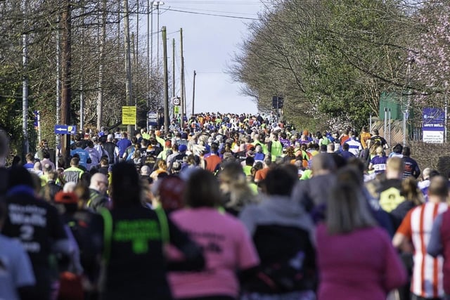 The crowds were thick as the ran began, but quickly thinned out.