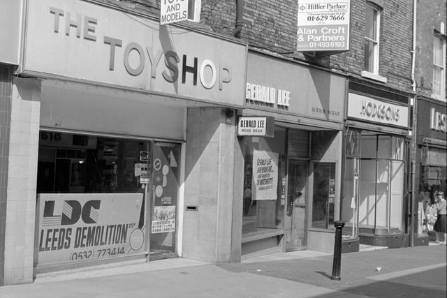 This photo, circa 1980, shows The Toyshop, Gerald Lee men's wear and Hodgson's - all closed.