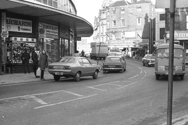 This photo was taken in January 1977 and shows the top of Westgate. Remember any of these shops?