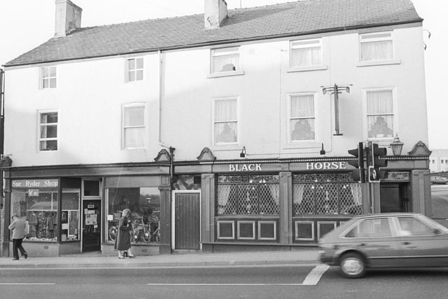 The Black Horse pub pictured in 1984, along with the Sue Ryder charity shop on the left hand side of the photo.