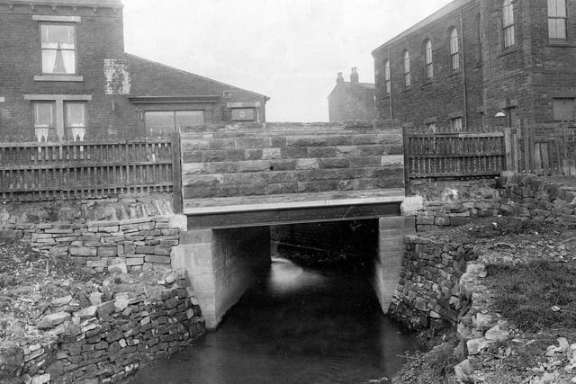 Branch Road, bridge over Wortley Beck. To the right is the United Reformed Methodist Chapel.