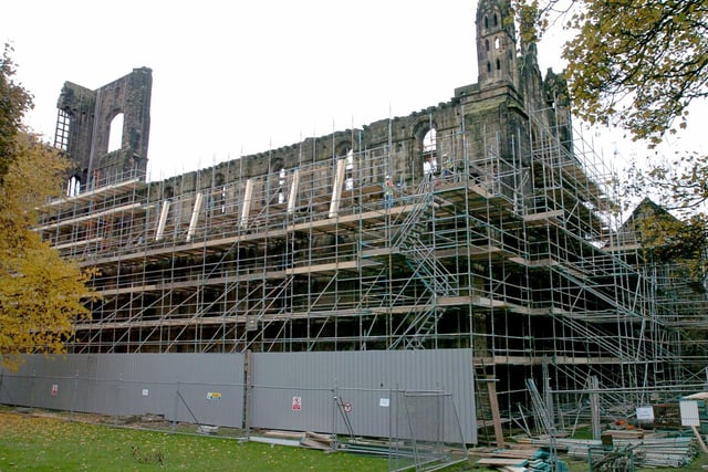 Scaffolding covers Kirkstall Abbey at the start of a multi-million pound programme of conservation and improvements.