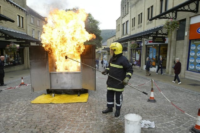 Back in 2003 visitors saw an unusual sight in Halifax town centre as  fire fighters recreated a chip fan in the middle of Woolshops.
