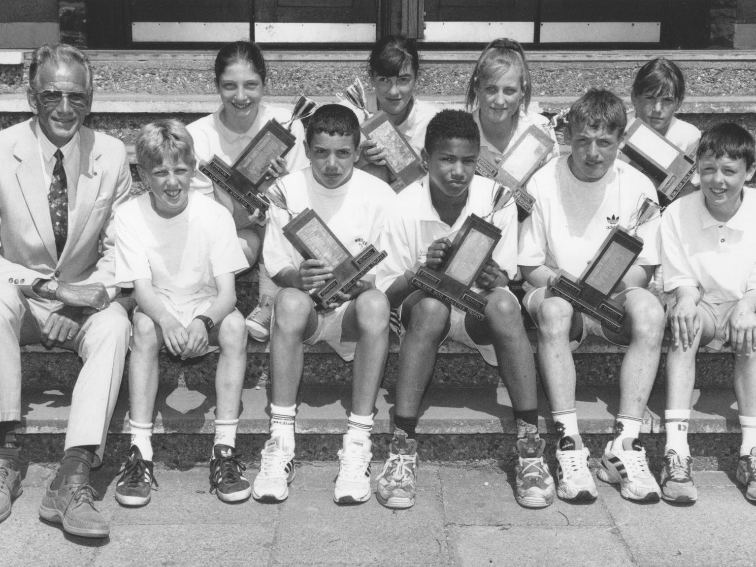 Graham School head teacher Milton Bowers, left, is pictured with school's sports day winners in June 1996. Back, J Black, J Pettitt, A Prince, S Webb; front, C Hill, A Connell, JJ Wilkinson, D O'Neill, C Dove.