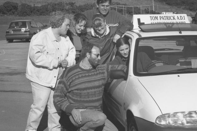 Teenagers got behind the wheel with Scarborough driving instructors for some early learning lessons at Graham School in October 1996. 
Scalby and Graham School pupils Helen Beaumont, left, Tracy Hughes and Sarah Owen look on as driving instructor Tom Patrick, kneeling, talks with pupil Toni Newman, in the driving seat, with Jon Coates, back right, community education officer also looking on.