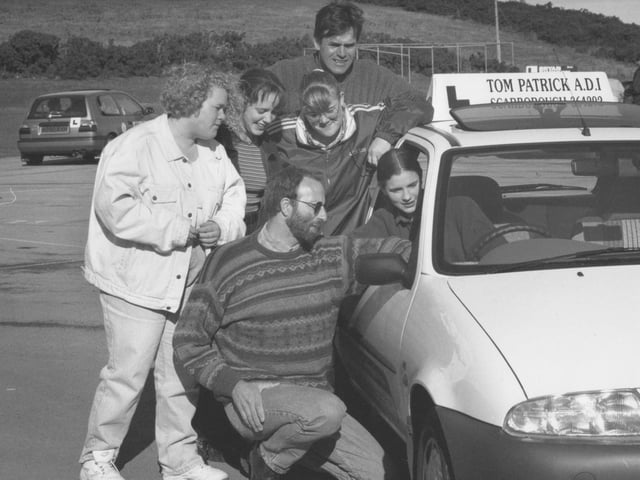 Teenagers got behind the wheel with Scarborough driving instructors for some early learning lessons at Graham School in October 1996.
Scalby and Graham School pupils Helen Beaumont, left, Tracy Hughes and Sarah Owen look on as driving instructor Tom Patrick, kneeling, talks with pupil Toni Newman, in the driving seat, with Jon Coates, back right, community education officer also looking on.