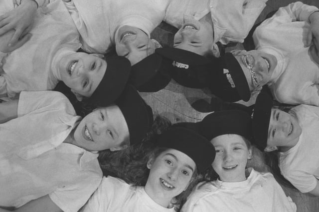 Eight of the YMCA members wearing their Comic Relief petrol coupon Splat! hats that were being used in a show back in March 1993. Do you feature in this photo?