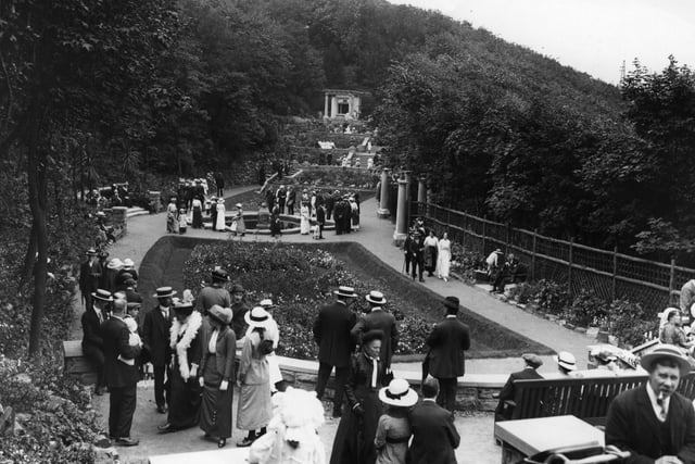 This photo is from around 1900 and shows a view of Victorians enjoying the Italian Gardens, on South Cliff.