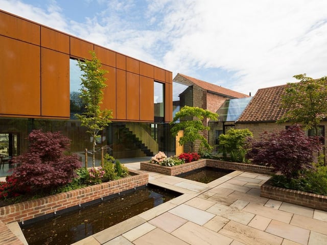 Manor Ridge Barns, North Yorkshire, by TAS Architects. A contemporary, sustainable family home which incorporates and enhances the existing buildings whilst complementing them with new, innovative additions. Photo: Sean Elliott