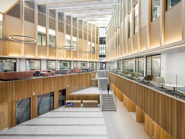 Nexus, Leeds, by Associated Architects. Design incorporates a strong horizontal emphasis from the listed Stoner building, crisp anodized metal from the MSCP, warmer bronzed cladding echoes the softer tones of the redbrick buildings of the nearby Conservation Area. Photo: Mike Dinsdale