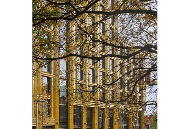 St Albans Place, Leeds, by Feilden Clegg Bradley Studios. Drawing on Leeds' traditional ceramic and textile industries, the building faade is expressed as a woven pattern of glazed bronze ceramices. Photo: Will Pryce