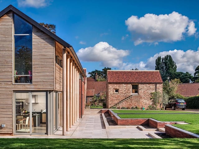 The Longhouse, Heslington, York, by Bramhall Blenkharn. A new family home, in a Conservation area, which is a mixture of newbuild and renovation of two storey brick barns. The intention was to provide a new building, which reflected the agricultural heritage of the site in terms of scale and materials. Photo: Jim Varney