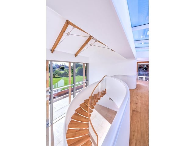 The Longhouse, Heslington, York, by Bramhall Blenkharn. The central part of the house is a magnificent double height hall containing a staircase designed and installed by Bisca. Photo: Jim Varney