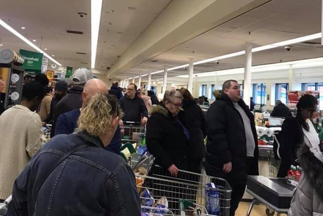 Shoppers queuing in Morrisons cc Kay Webster