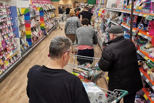 Some shoppers had to navigate the aisles to queue