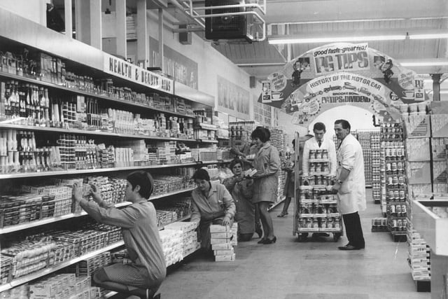 Did you shop at the Lion Store on Providence Street back in the day? Staff stock the health and beauty section in November 1968.