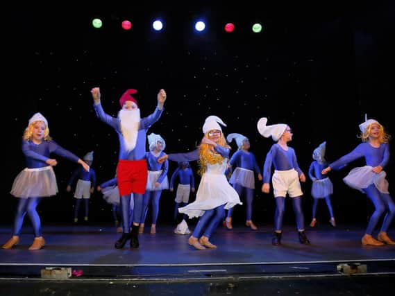 The Club Colebrooke class perform as Smurfs.