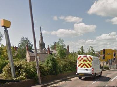 This camera is at the traffic lights on the junction with St John Street, heading out of the town centre.