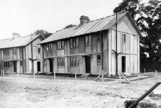 Pre-fabricated houses under construction on the Cross Gates estate.