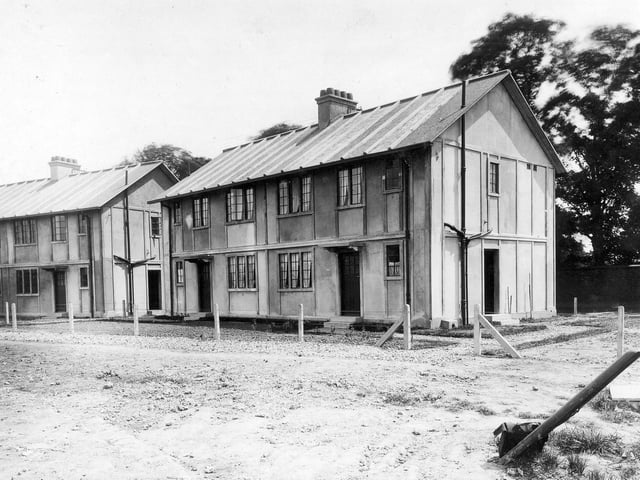 Pre-fabricated houses under construction on the Cross Gates estate.