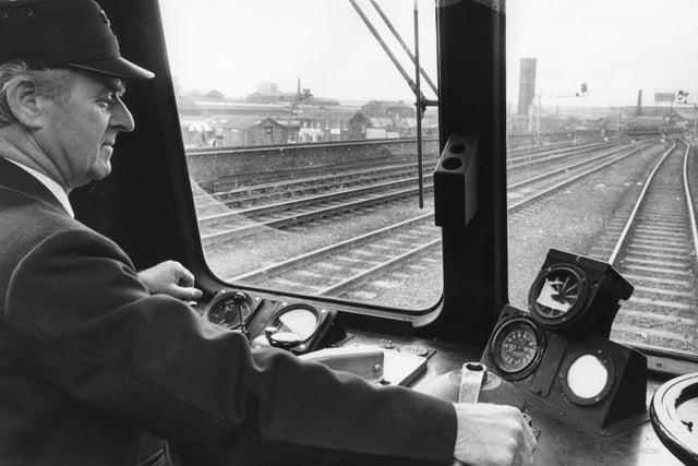 Driver Bill Addy at the controls of a train on the Leeds to Bradford line.