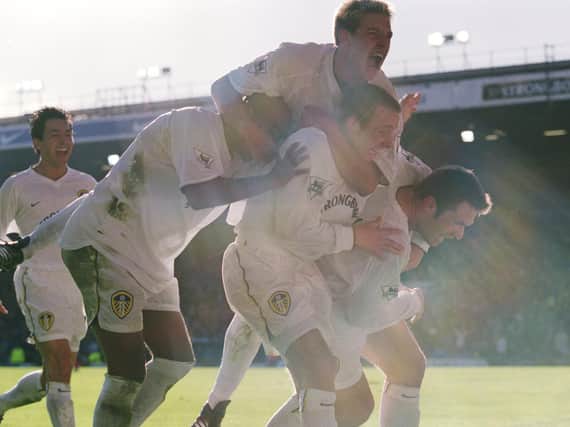 Leeds United's players celebrate at Elland Road against Liverpool. (Image: Getty)