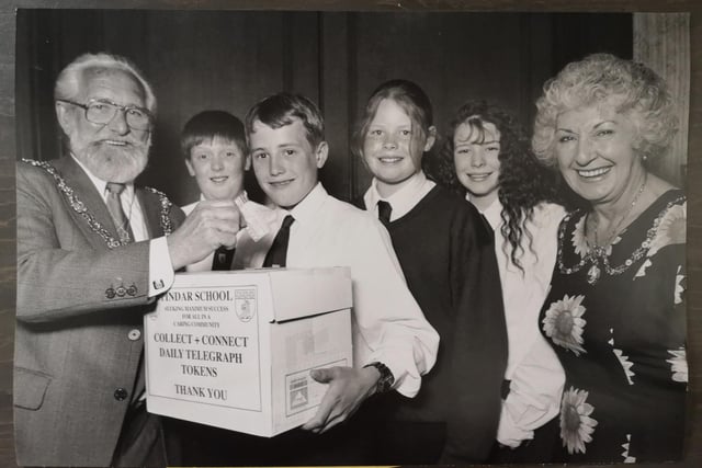 The Mayor of Scarborough Cllr Ted Agar launched the Pindar School tokens appeal in June 1996 and is pictured with, left to right, Pindar pupils Dean Johnstone, Ryan Ward, Jennifer Linton, Melanie Triffitt and, far right, Mayoress Mrs Janice Agar.