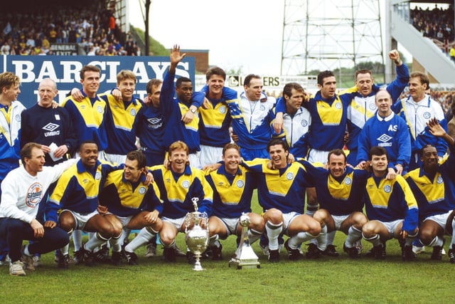 Leeds United captain Gordon Strachan (4th left front row) with the Football league Division One trophy for the 1991/92 season (Pic: Getty)