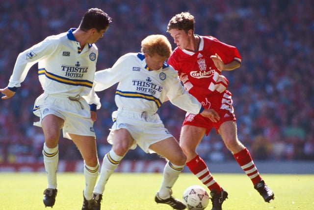 Gary Kelly (l) and Gordon Strachan (c) attempt to halt Steve McManaman during a Premier League match between Liverpool and Leeds United on August 28 1993 (Pic: Getty)