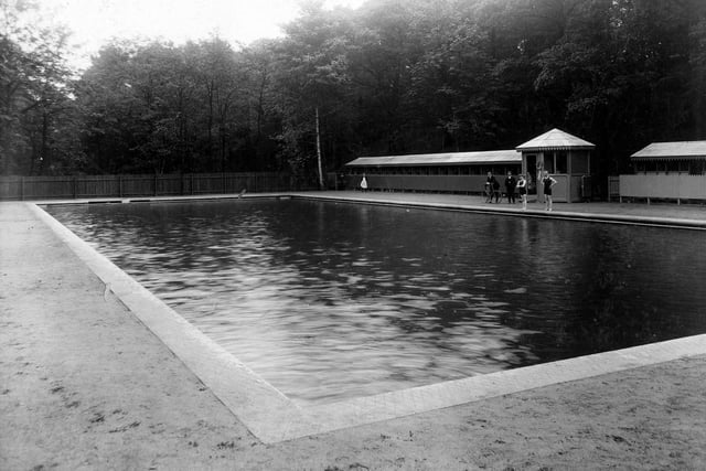 Roundhay Park Bathing Pool. Changing cubicles visible on the right, bathers and onlookers can be seen. These public baths were opened on the 19th June 1907 at a cost 1,657 and were built by the unemployed.